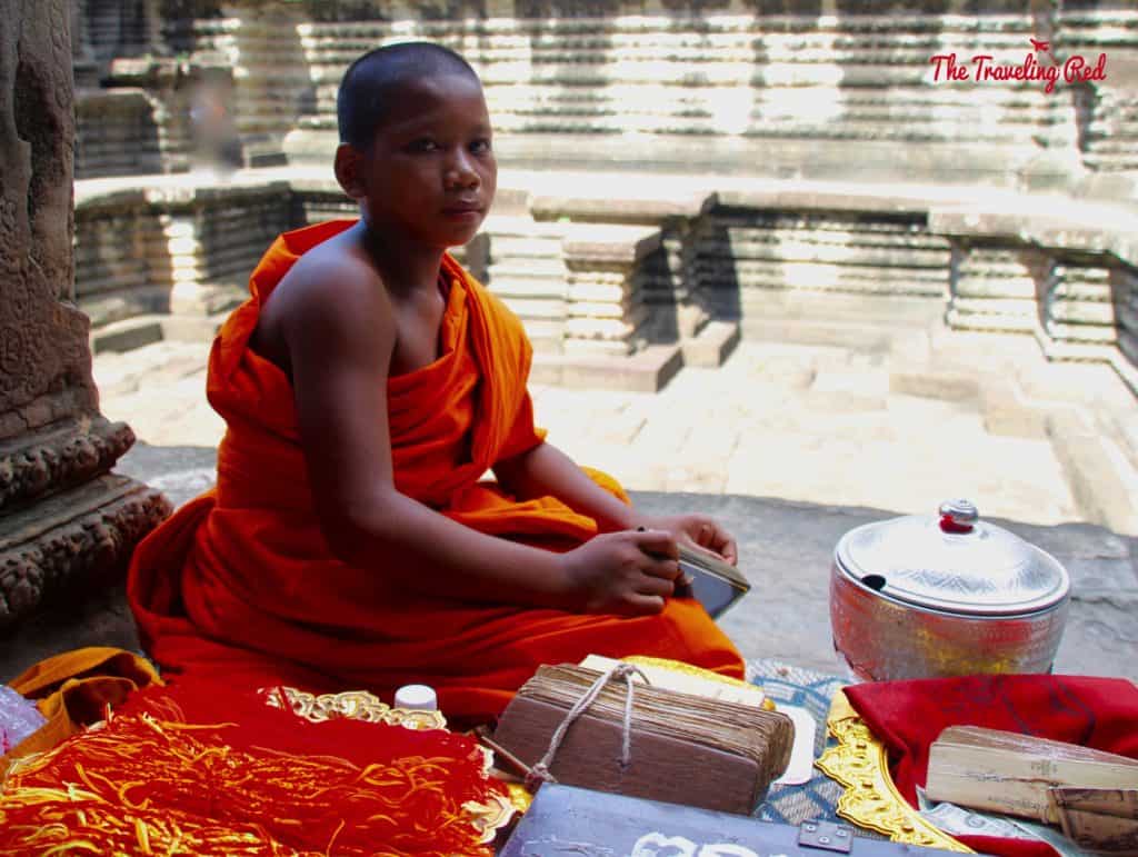 Young Monk in Angkor Wat | Cambodia Temples | Siem Reap | Angkor Wat | Angkor Passes | Photography Tour | Angkor Archeological Park | Ta Prohm | Tomb Raider | Banteay Kdei | Ta Nei | North Gate | Bayon | Wat Thmey | Monks | South Gate | Preah Khan #siemreap #angkorwat #cambodia