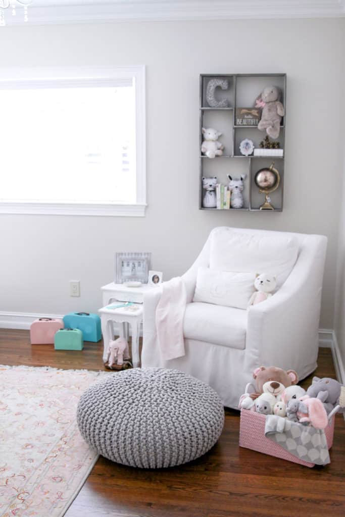 Reading nook and nursing rocker in our rustic chic pink and white girl nursery