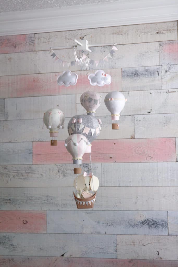 Custom Bunny and Hot Air Balloon Mobile in a Pink & White Rustic Chic Baby Nursery- complete with a custom white and pink distressed wood wall