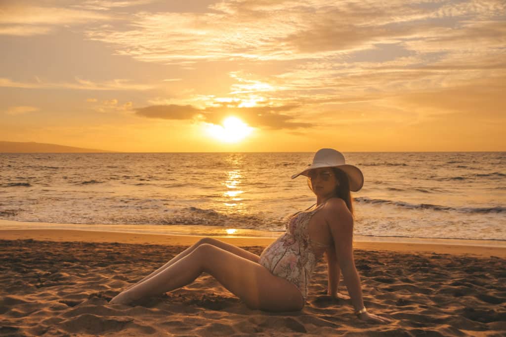 Enjoying a beautiful sunset in Maui during my Babymoon in Hawaii