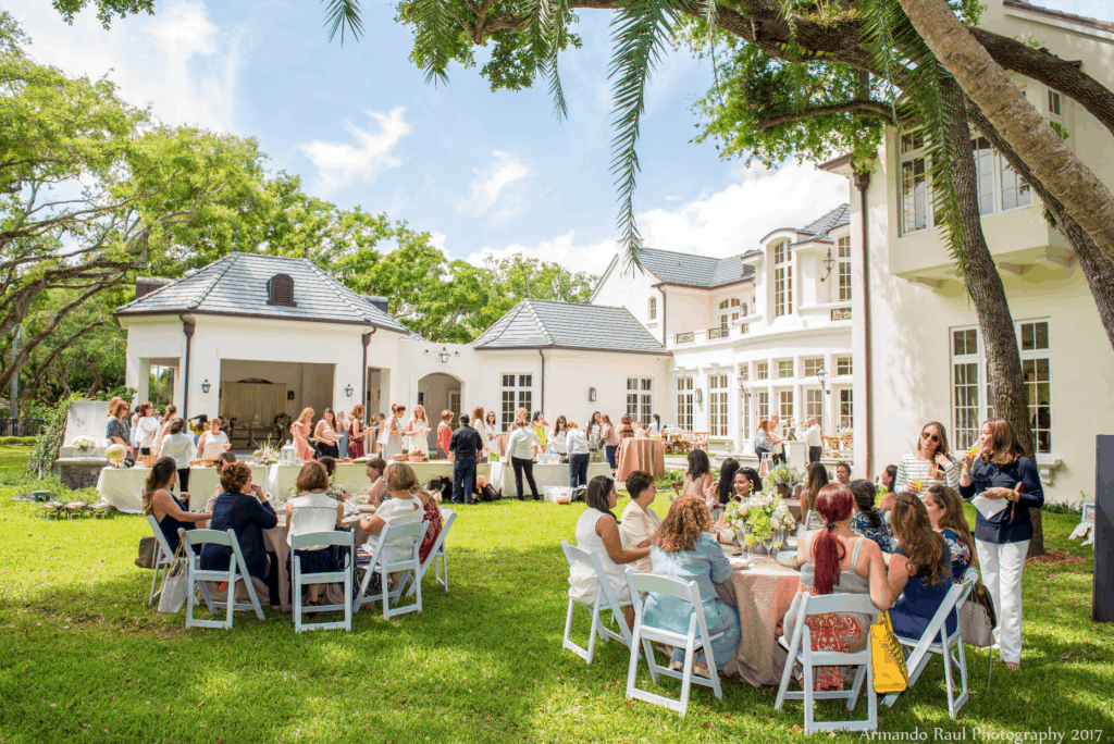 Outdoor seating setup for a Vintage Travel girl baby shower outside in the backyard at home