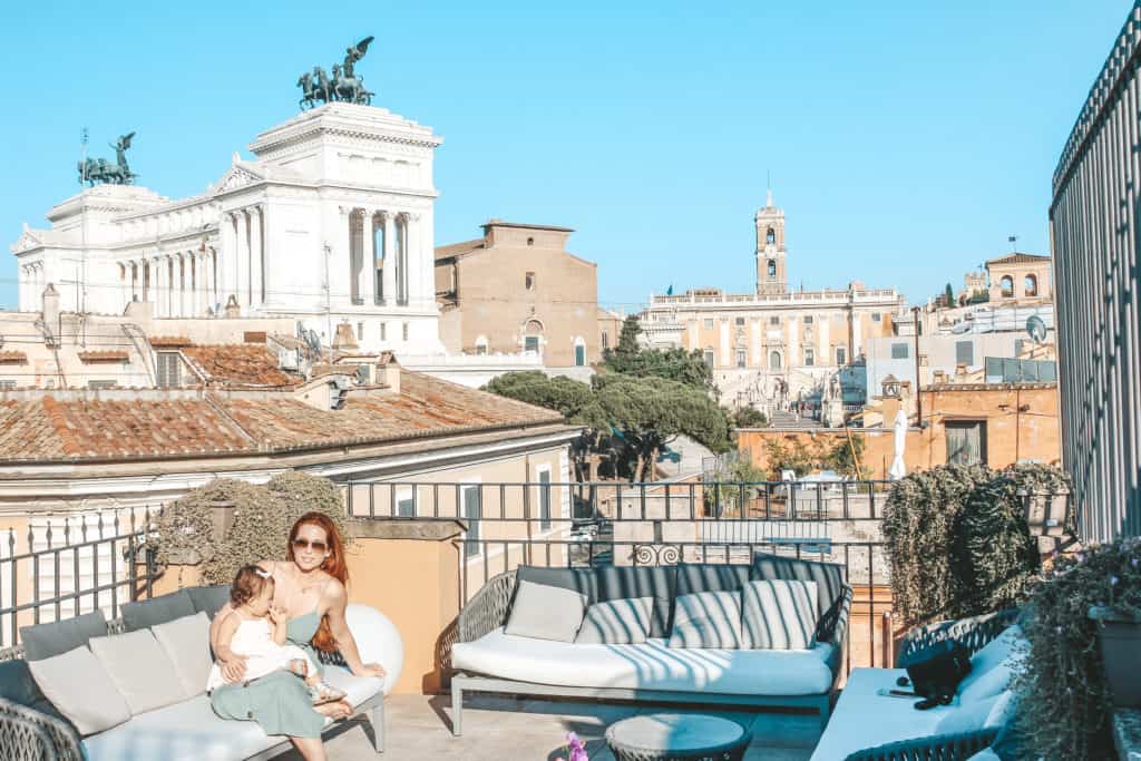 The rooftop bar at the Otivm Hotel in the city center of Rome, walking distance from most of the main sites. It's a budget friendly boutique hotel with great service and super spacious rooms - ours even had a king size bed. Rome | Italy | budget friendly boutique hotel | great service | spacious rooms | king size bed | rooftop bar overlooking the city | best hotel #rome #italy #italia #otivmhotel #besthotel #rooftopbar