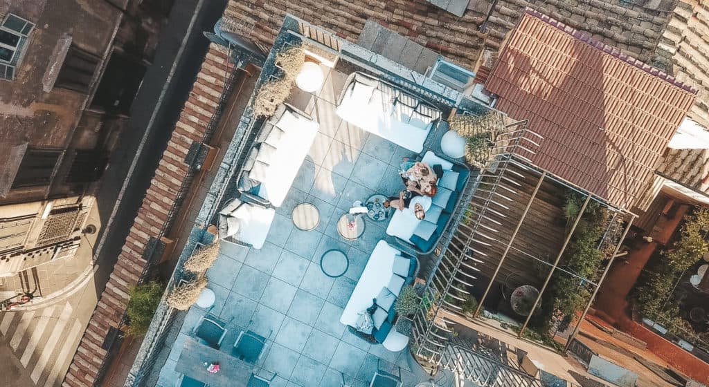 The rooftop bar at the Otivm Hotel in the city center of Rome, walking distance from most of the main sites. It's a budget friendly boutique hotel with great service and super spacious rooms - ours even had a king size bed. Rome | Italy | budget friendly boutique hotel | great service | spacious rooms | king size bed | rooftop bar overlooking the city | best hotel #rome #italy #italia #otivmhotel #besthotel #rooftopbar