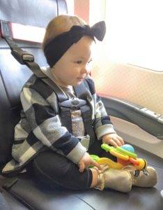 Airplane harness for a kid. Turns a regular airplane seat into a carseat with a full harness. Much easier than carrying a car seat onto the plane and allows for a safe way to travel. Lap child vs purchasing a seat 