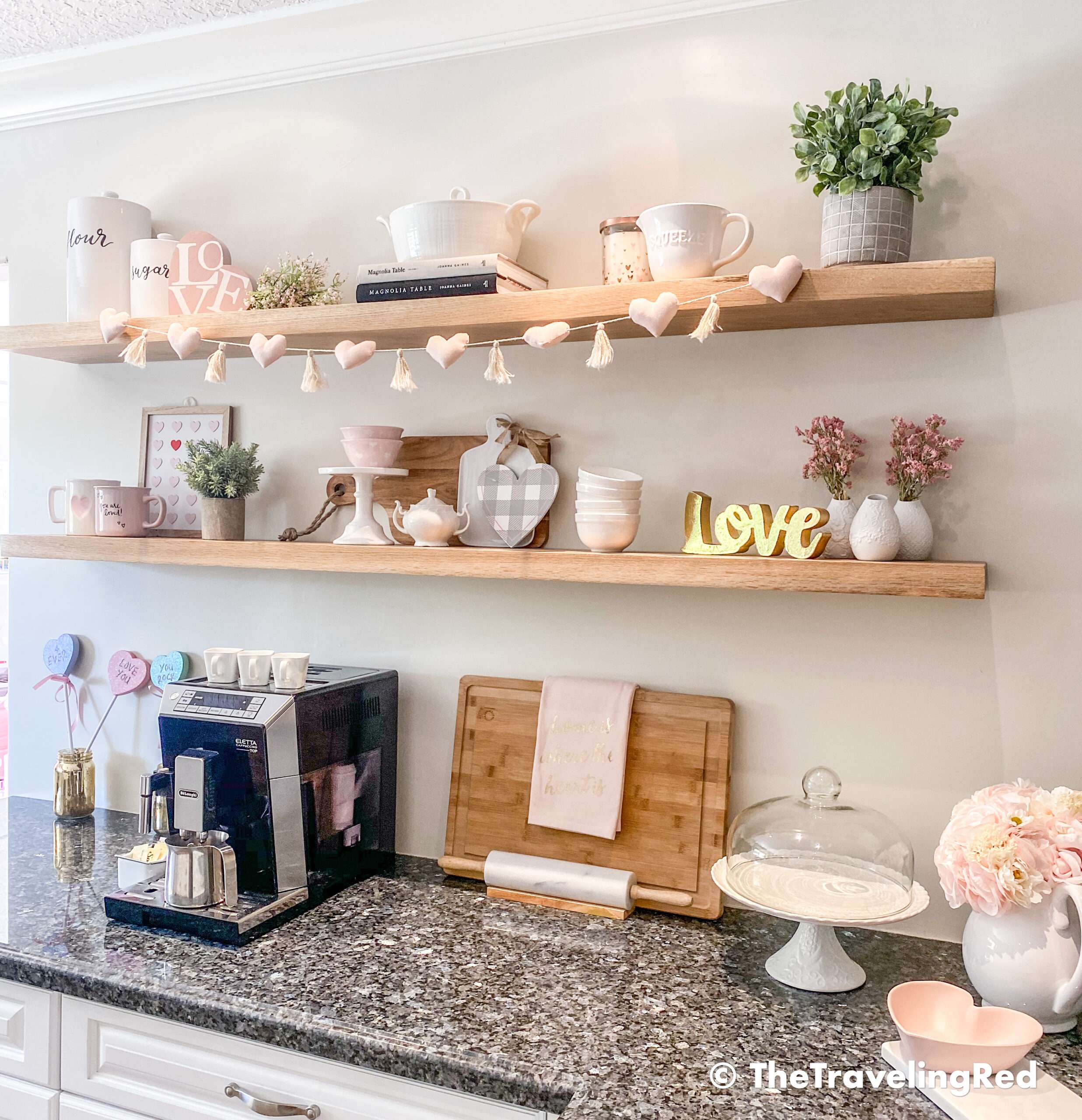 Valentine's Day Home Decor - Kitchen Shelves styling using soft pinks, garlands, artificial flowers, wood signs and some fun kitchen pieces - #valentinesday #valentinesdaydecor #homedecor #kitchenshelves #valentinesdayhomedecor