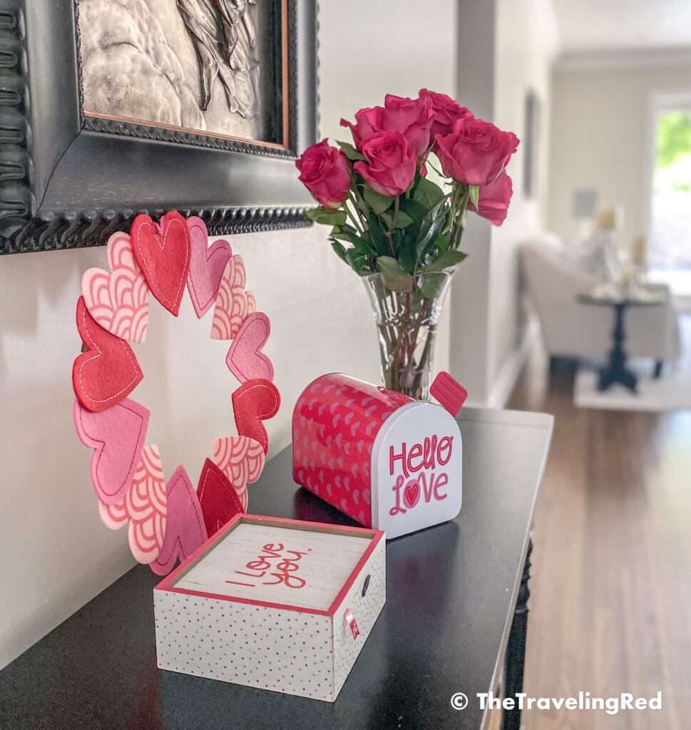 Valentine's Day Home Decor - Front entrance table with a simple wreath, mailbox, keepsake box and some fresh pink roses - #valentinesday #valentinesdaydecor #homedecor #tabledecor #valentinesdayhomedecor
