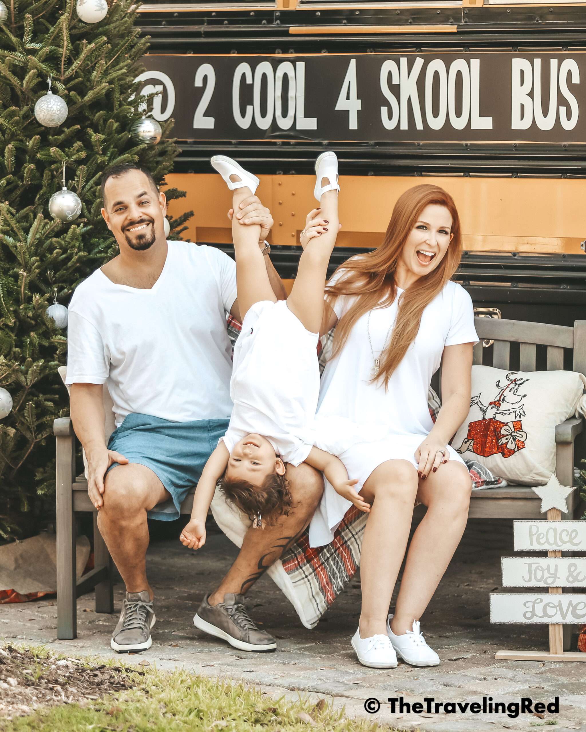 If your kid doesn't want to take a family photo, just flip them upside down. You'll get a great photo and a true reaction. Surprise a child that doesn't want to smile or pose for a picture. Another mom hack from a mommy blogger and influencer. #MomHacks #KidPhotography #MomTips #Toddlers #PhotographyTips