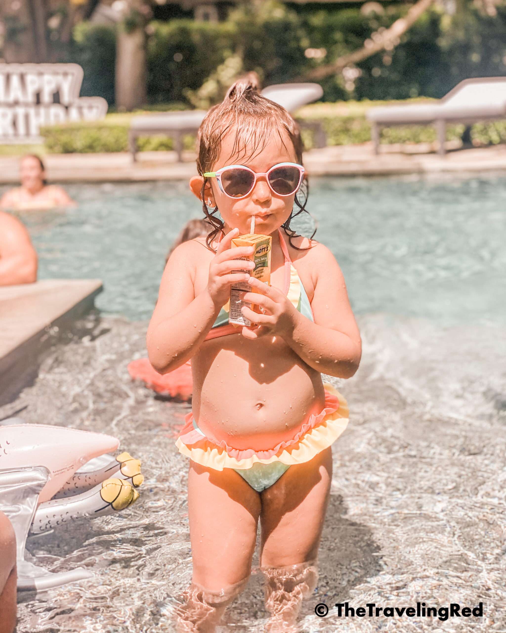 Mom Photography Hacks: Give your kid something to do like drinking juice, instead of asking them to pose for a picture. Just keep them busy. Make them focus so you can photograph them #MomHacks #KidPhotography #MomTips #Toddlers #PhotographyTips