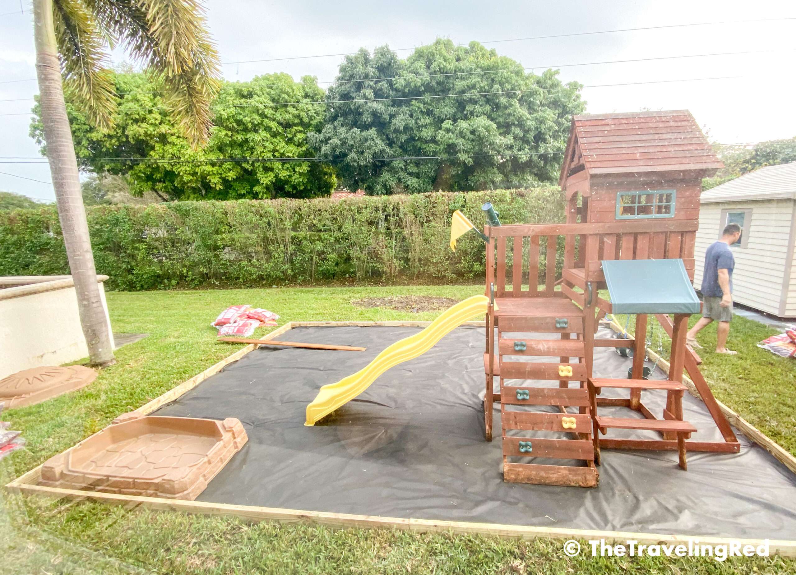 How to build a custom backyard playground with rubber mulch. Step 5 is to figure out the placement of the outdoor toys and adjust as needed. This space will fit our swingset, playhouse, sandbox or any other outdoor toys you plan to include. Perfect little outdoor play space for your kids to enjoy playing outside.