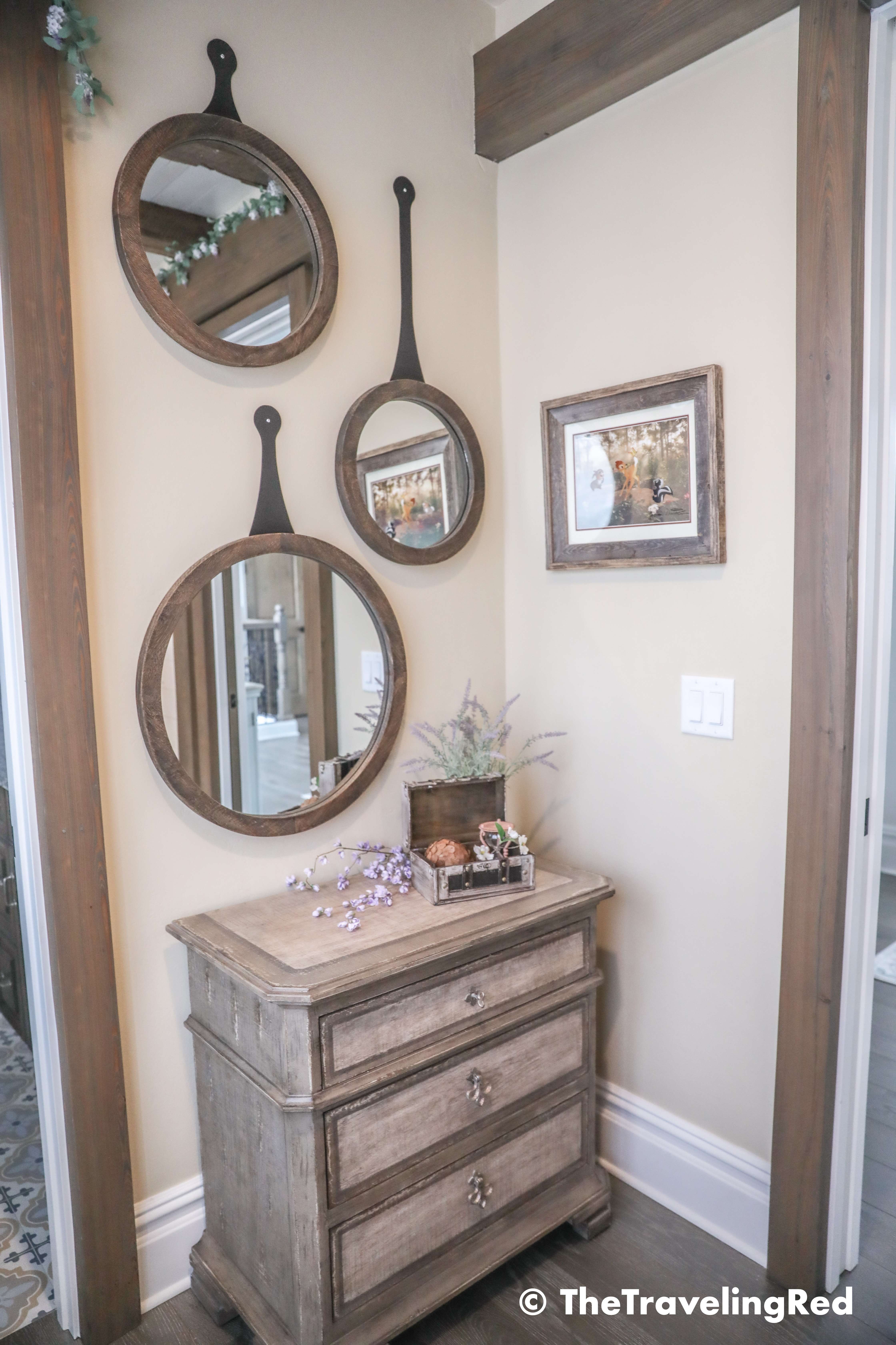 Bambi bunk bed room inside our Disney Golden Oak home. Inspiration for a tiny kids bedroom full of rustic charm and character. Reclaimed wood beams, shiplap, flowers and lanterns fill the room, along with Bambi details.