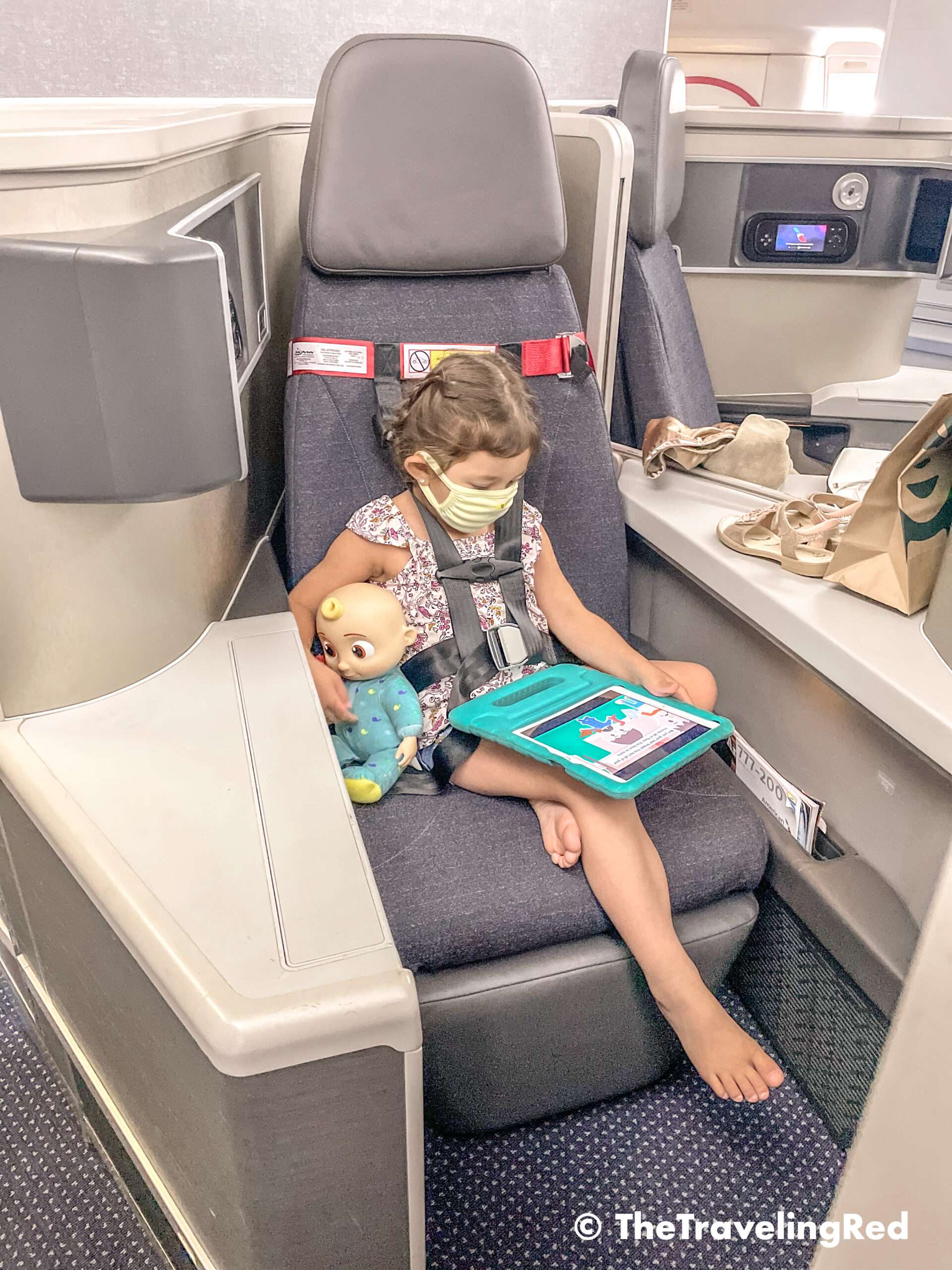 The best alternative for flying with a child and not taking a big car seat. FAA approved airplane harness as an alternative to installing a car seat on an airplane. It it small and fits in your purse. The harness works with the airplane lap belt to restrain similar to a car seat. It does not affect the person sitting behind you because it goes under their tray table.