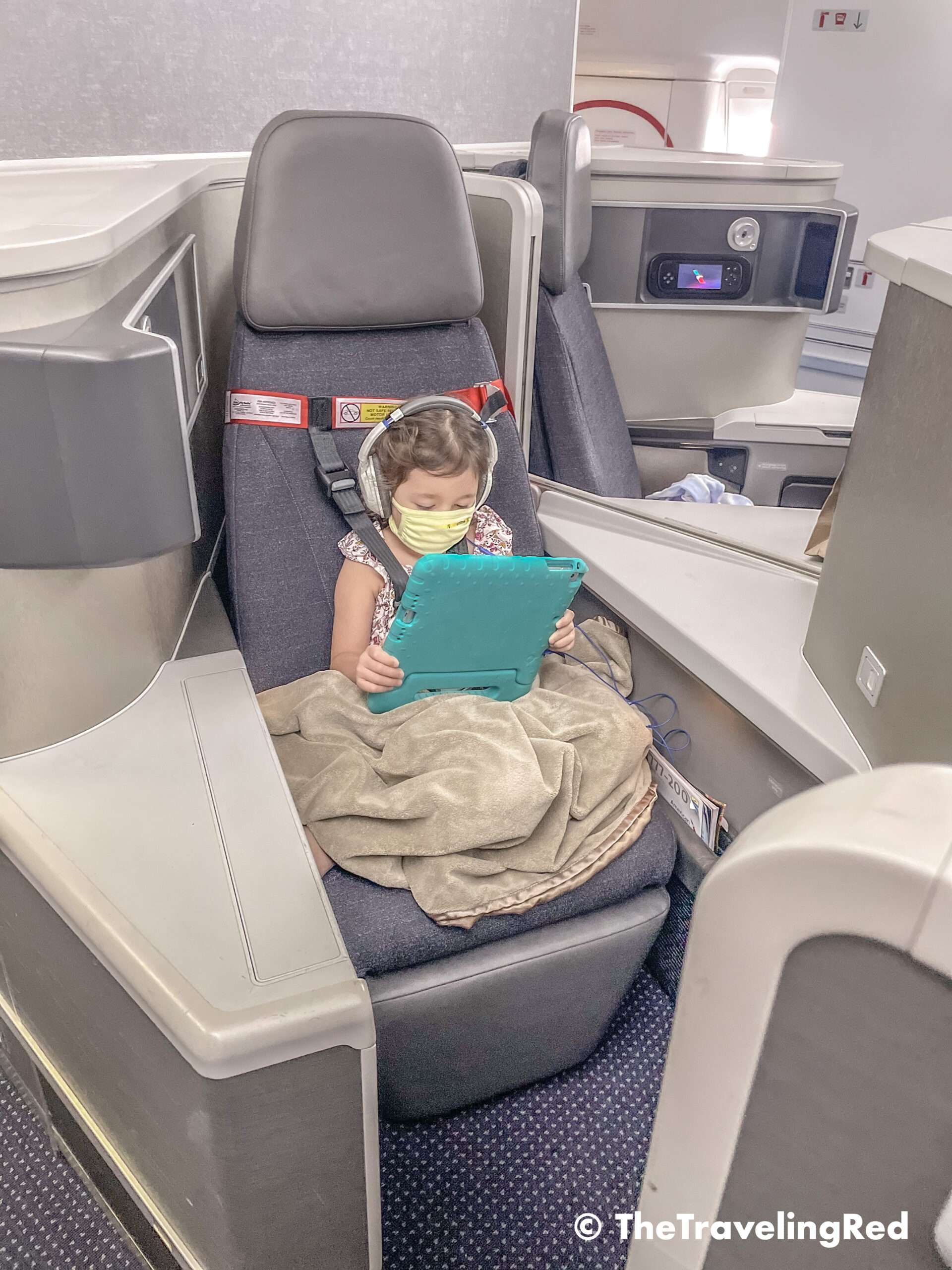 Travel hack for traveling with kids. FAA approved airplane harness as an alternative to installing a car seat on an airplane. It it small and fits in your purse. The harness works with the airplane lap belt to restrain similar to a car seat. It does not affect the person sitting behind you because it goes under their tray table.