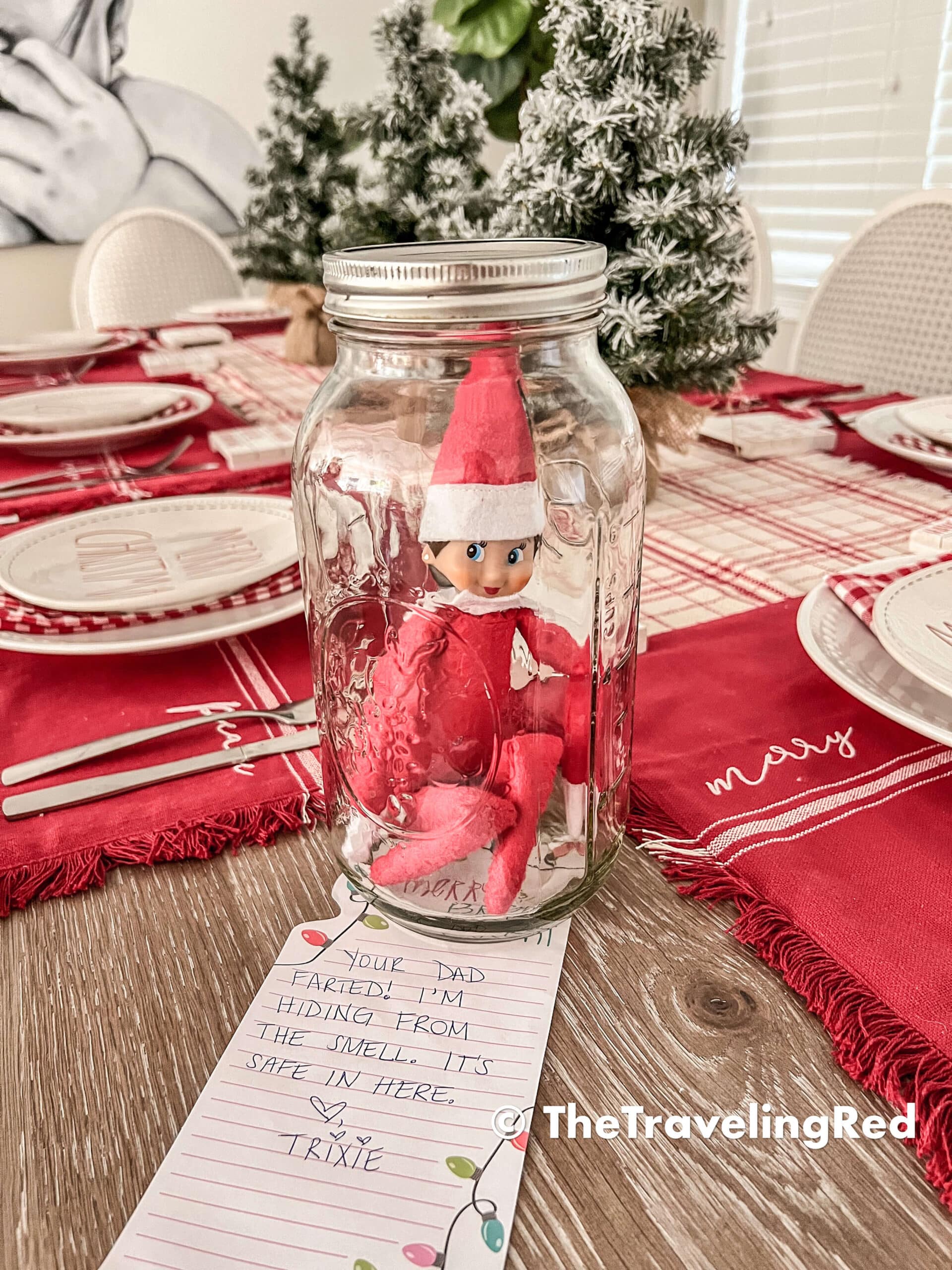 Naughty Elf on the shelf was hiding in a mason jar because dad farted and the jar kept her safe from the smell. Fun and easy elf on the shelf ideas for a naughty elf that are quick and easy using things you have at home.