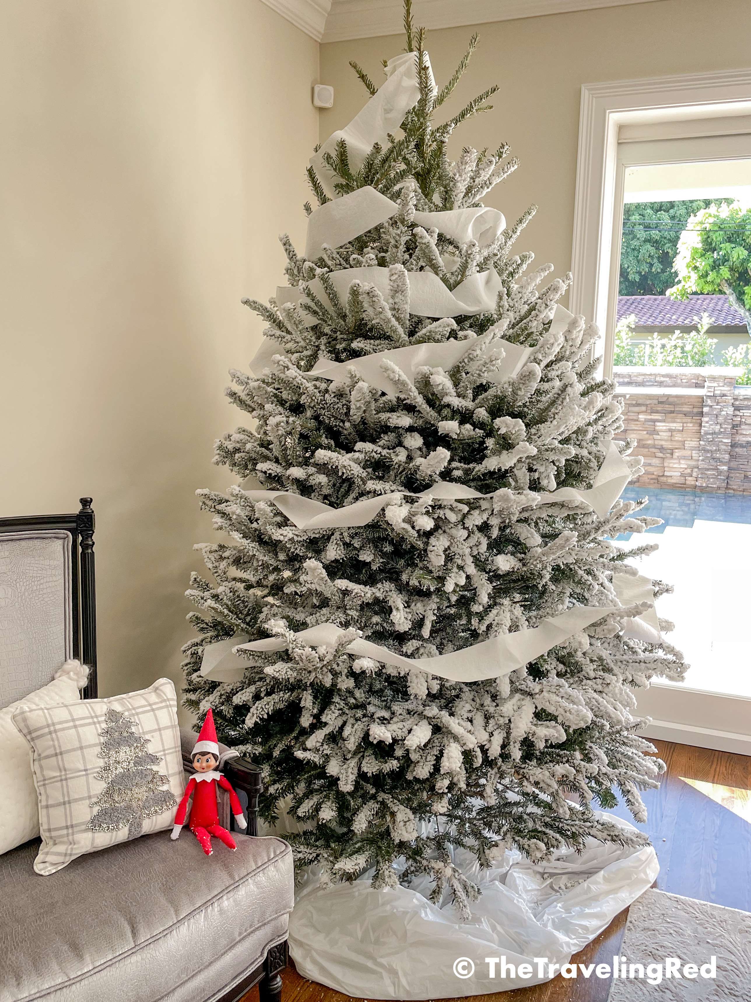Naughty Elf on the shelf put tiny bottle bruch Christmas trees on all of the toy cars. Fun and easy elf on the shelf ideas for a naughty elf that are quick and easy using things you have at home.