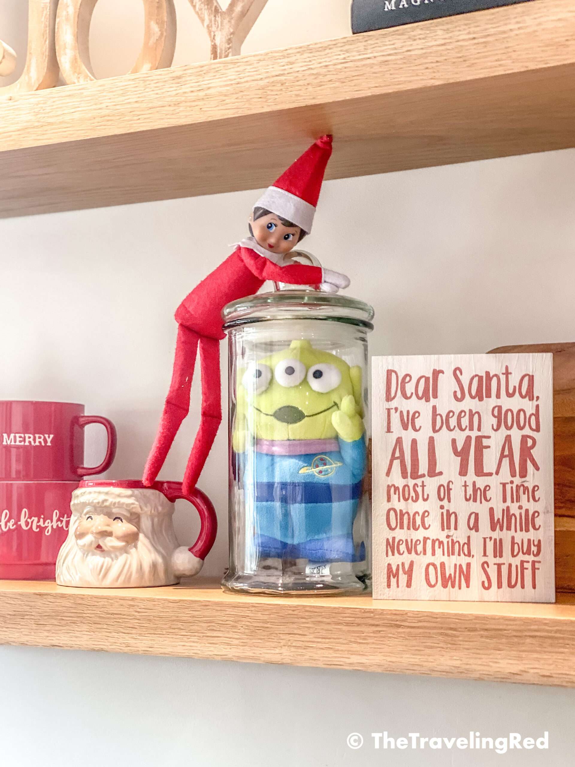 Naughty Elf on the shelf trapped a toy in a glass jar and wouldn't let him out. Fun and easy elf on the shelf ideas for a naughty elf that are quick and easy using things you have at home.