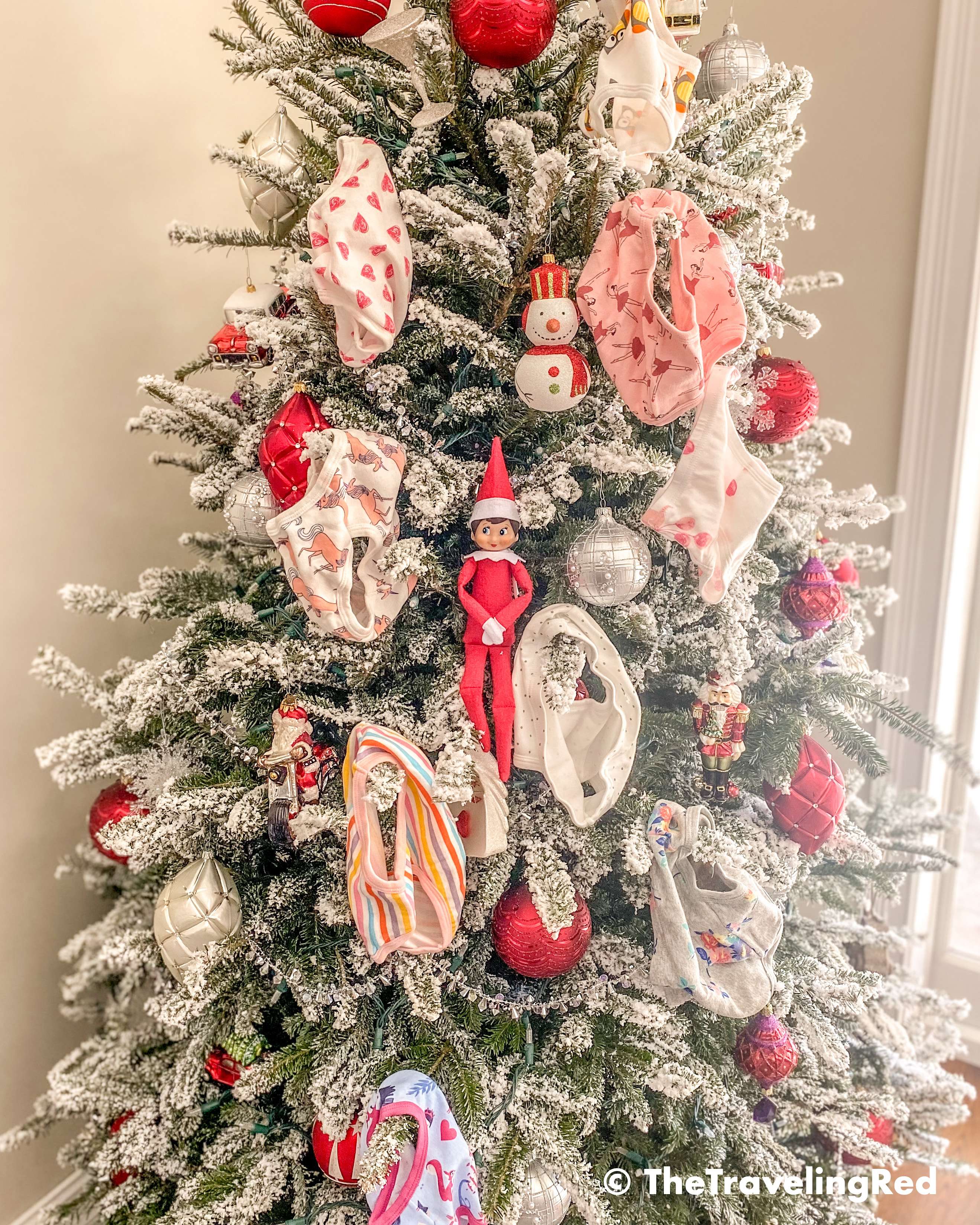 Naughty Elf on the shelf put undies or panties as decorations on the christmas tree. Fun and easy elf on the shelf ideas for a naughty elf that are quick and easy using things you have at home.