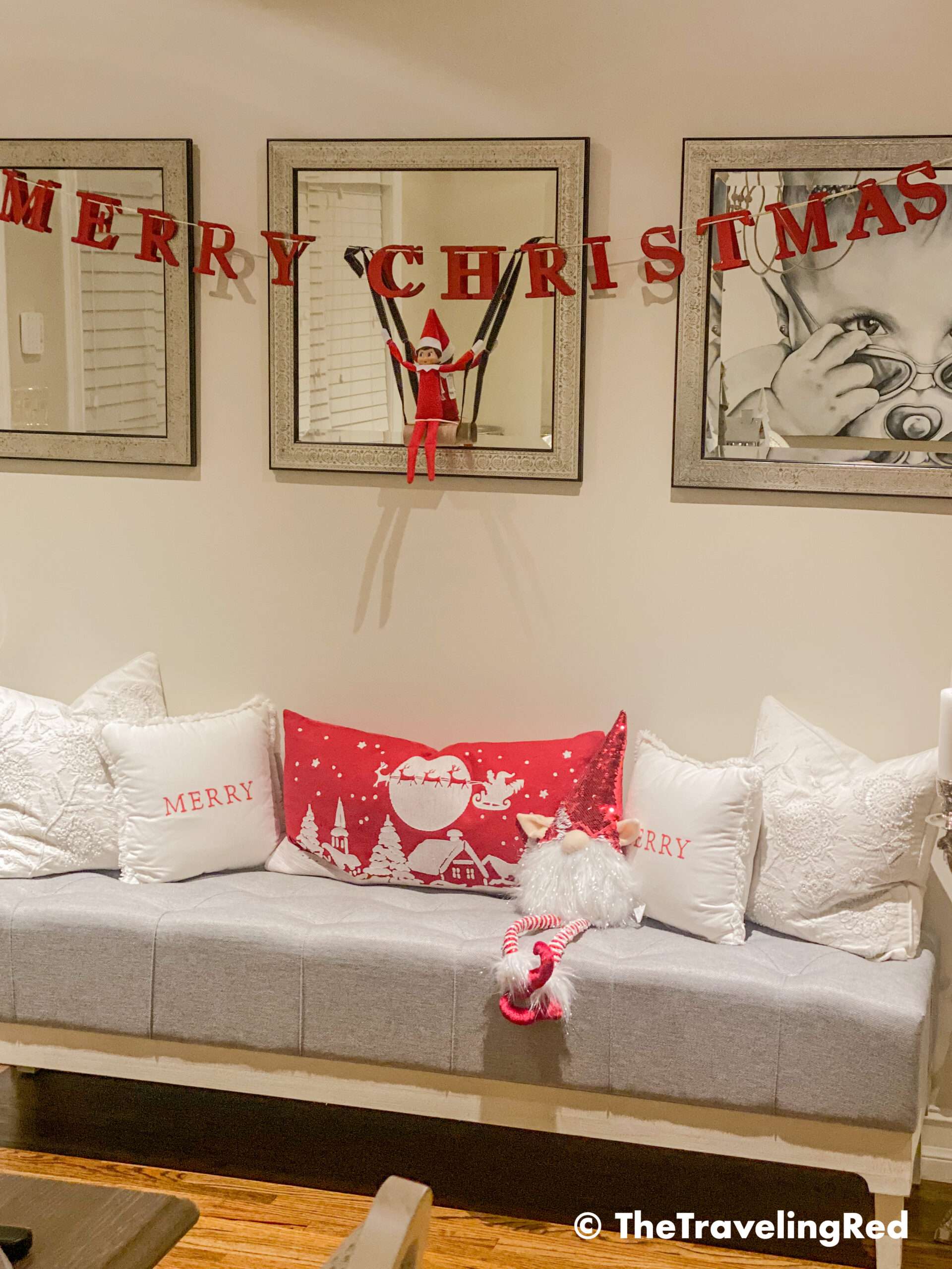 Naughty Elf on the shelf made a swing out of an empty toilet paper roll and some string. Fun and easy elf on the shelf ideas for a naughty elf that are quick and easy using things you have at home.