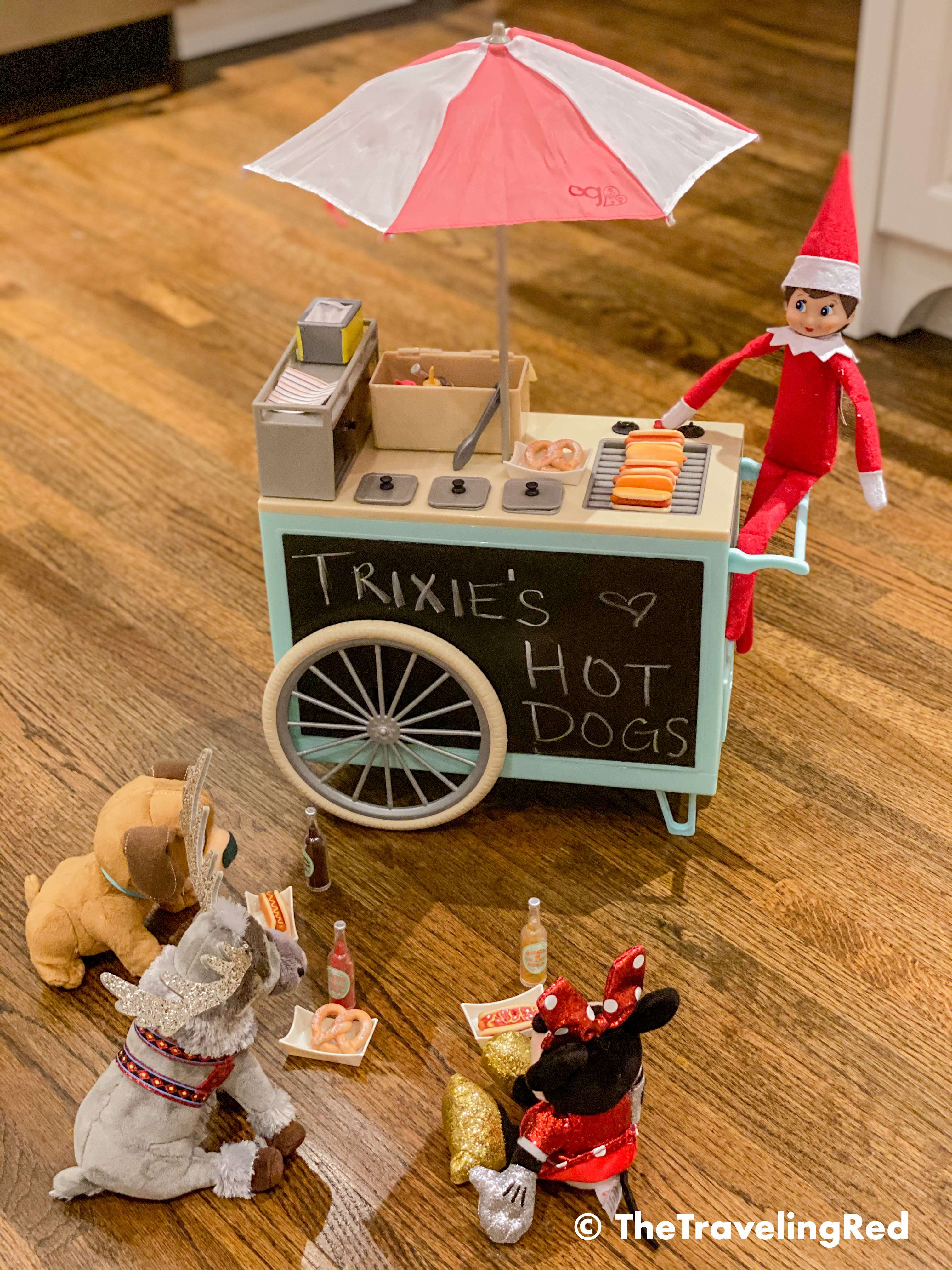 Naughty Elf on the shelf borrowed the hot dog stand to host a fun lunch for her friends. Fun and easy elf on the shelf ideas for a naughty elf that are quick and easy using things you have at home.