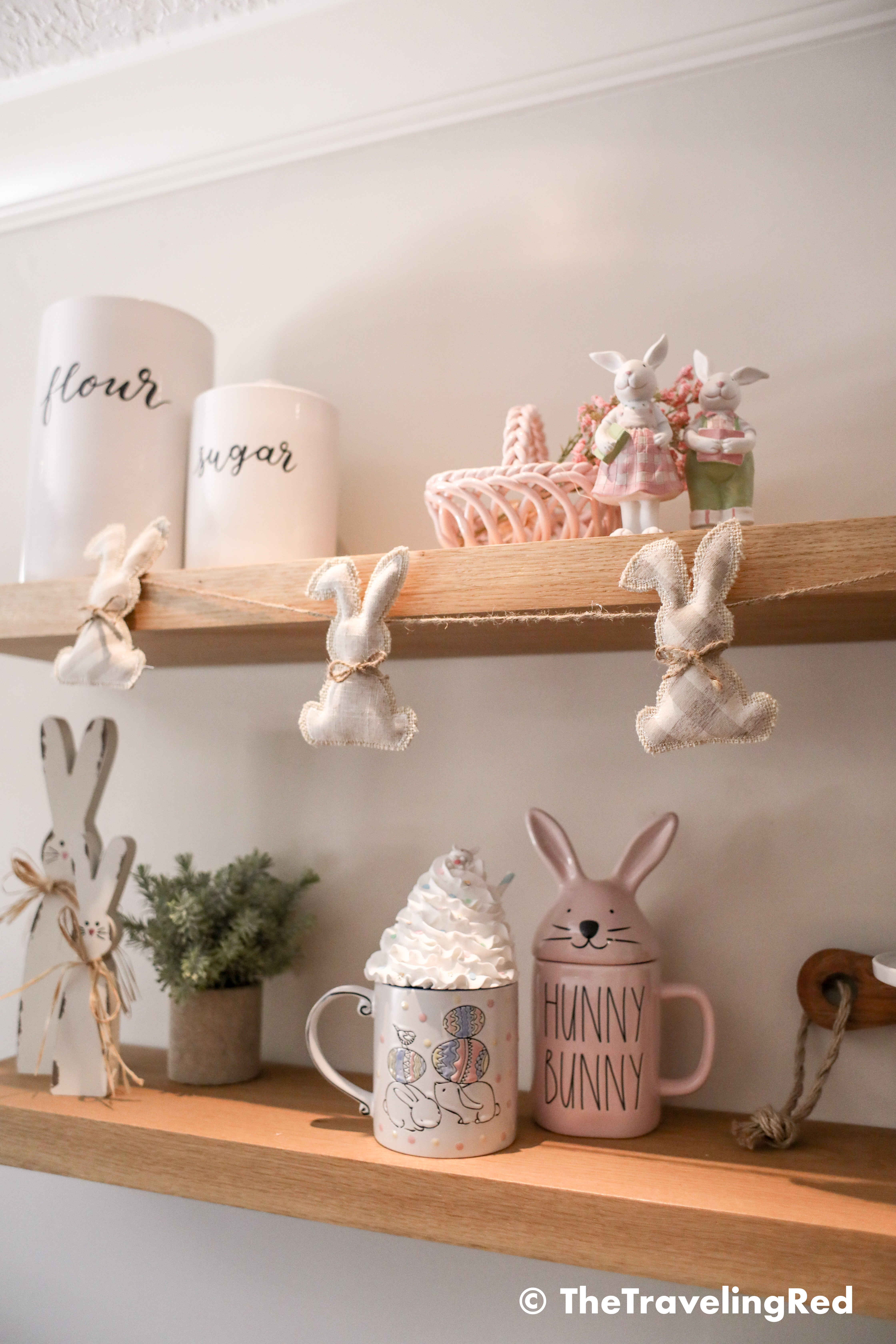 Kitchen easter shelf decor. Bunnies, candles, pastels, flowers all for my wood farmhouse shelving. Shelfie. Kitchen seasonal decorations.