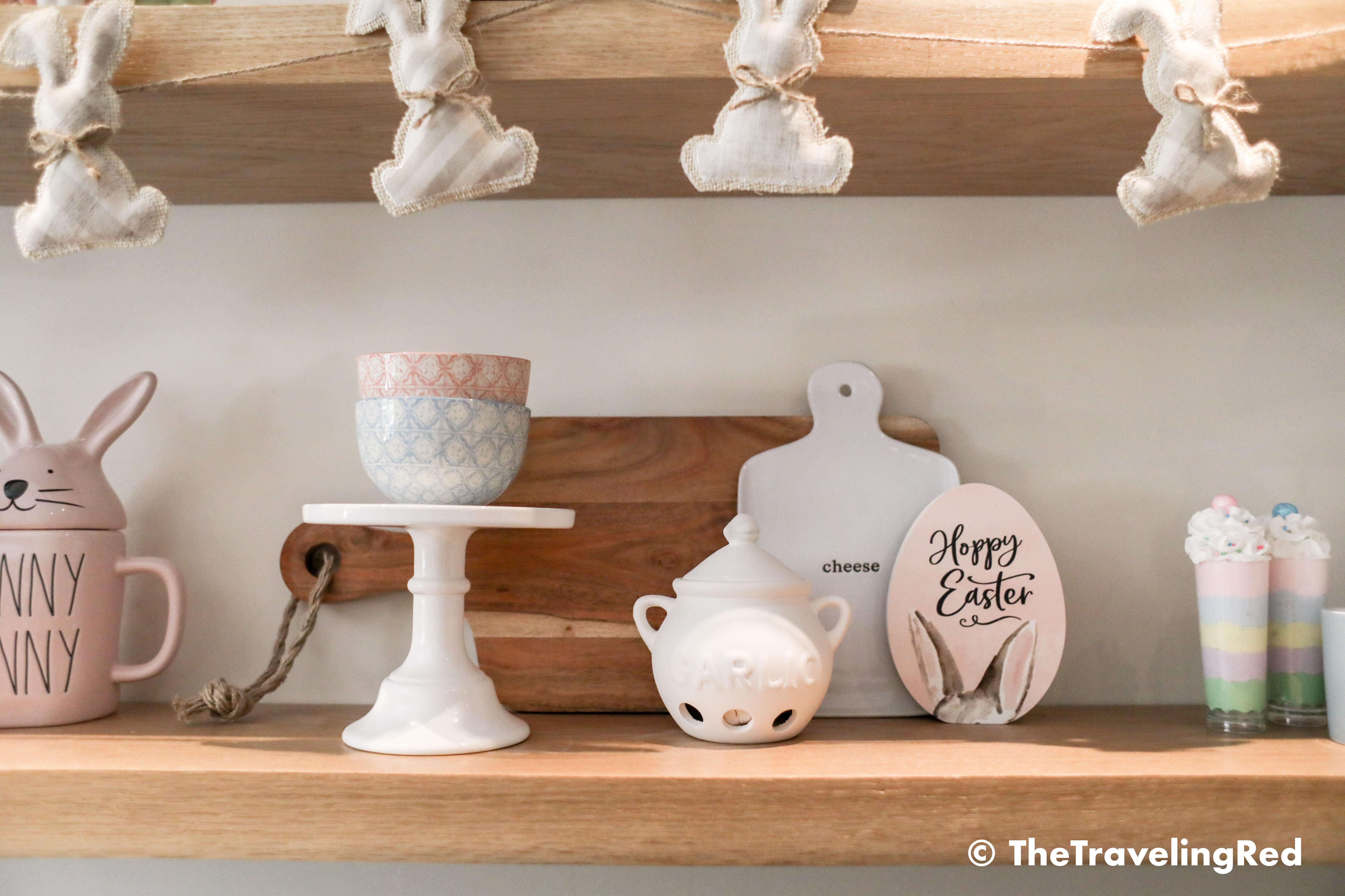 Kitchen easter shelf decor. Bunnies, candles, pastels, flowers all for my wood farmhouse shelving. Shelfie. Kitchen seasonal decorations.