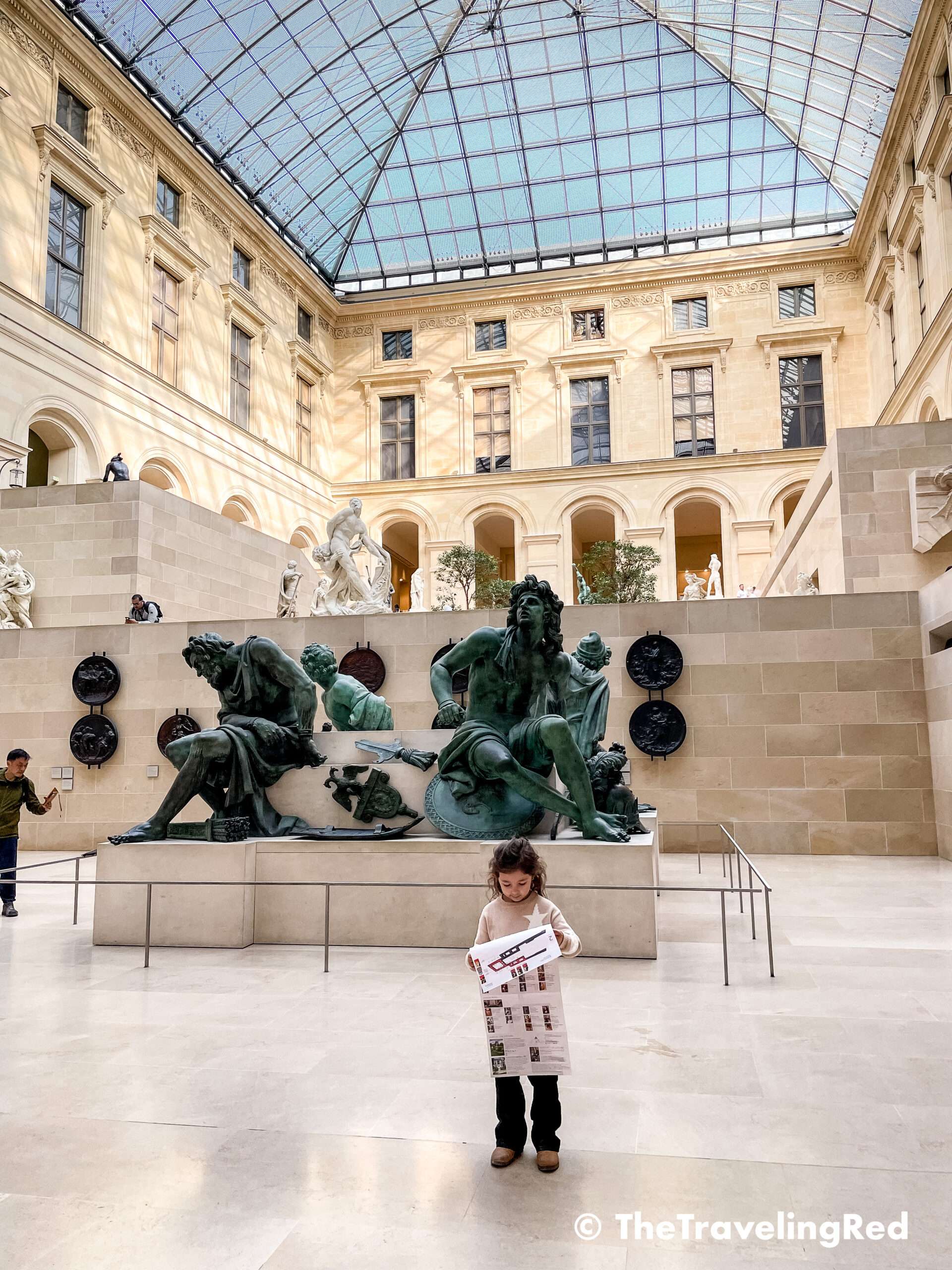 Family Photo Shoot in Paris with the Eiffel Tower. Little girl modeling in Paris. One of many fun things to do with your kids when visiting Paris France.