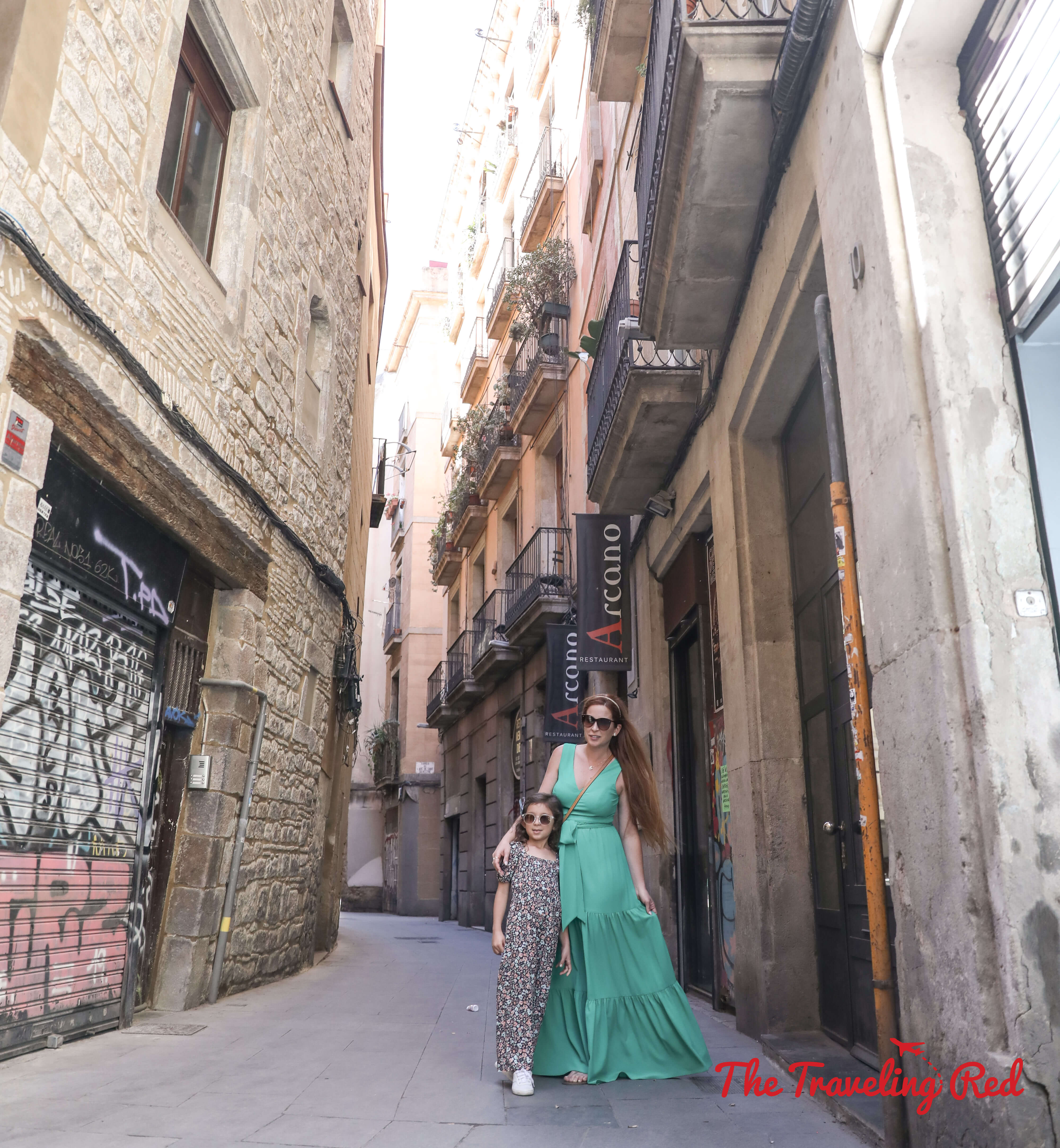 Exploring the Barrio Gotico in Barcelona, Spain. Beautiful old buildings line the old town of the Gothic Quarter. Here's our full 7 day barcelona itinerary. Everything you need to know for one week in Barcelona, Spain. By The Traveling Red