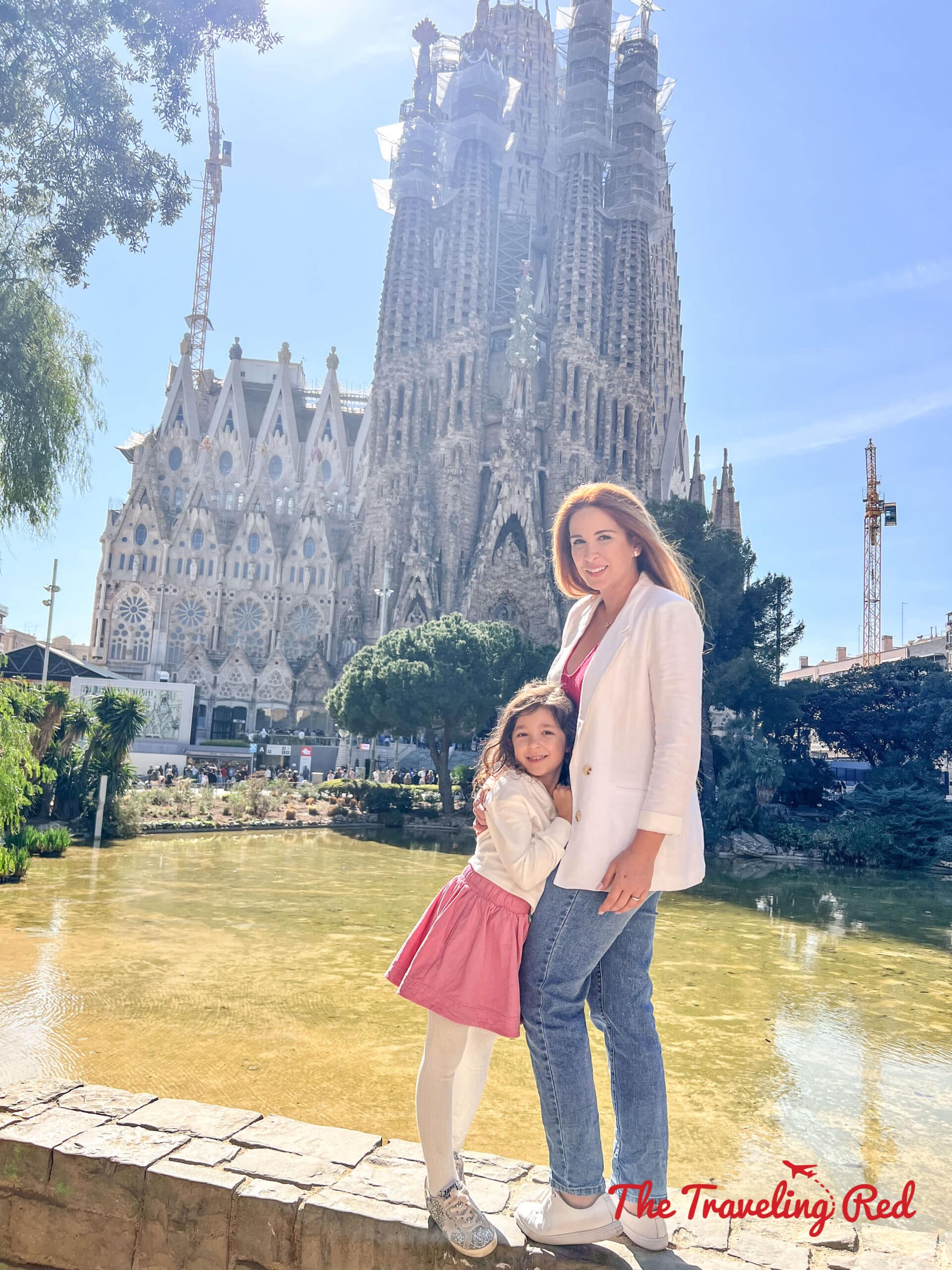 The Sagrada Familia in Barcelona, Spain. This famous work on Antoni Guadi is still under construction and expected to be completed in 2026. This is the famous view from the Plaza de Gaudi. Here's our full 7 day barcelona itinerary. Everything you need to know for one week in Barcelona, Spain. By The Traveling Red