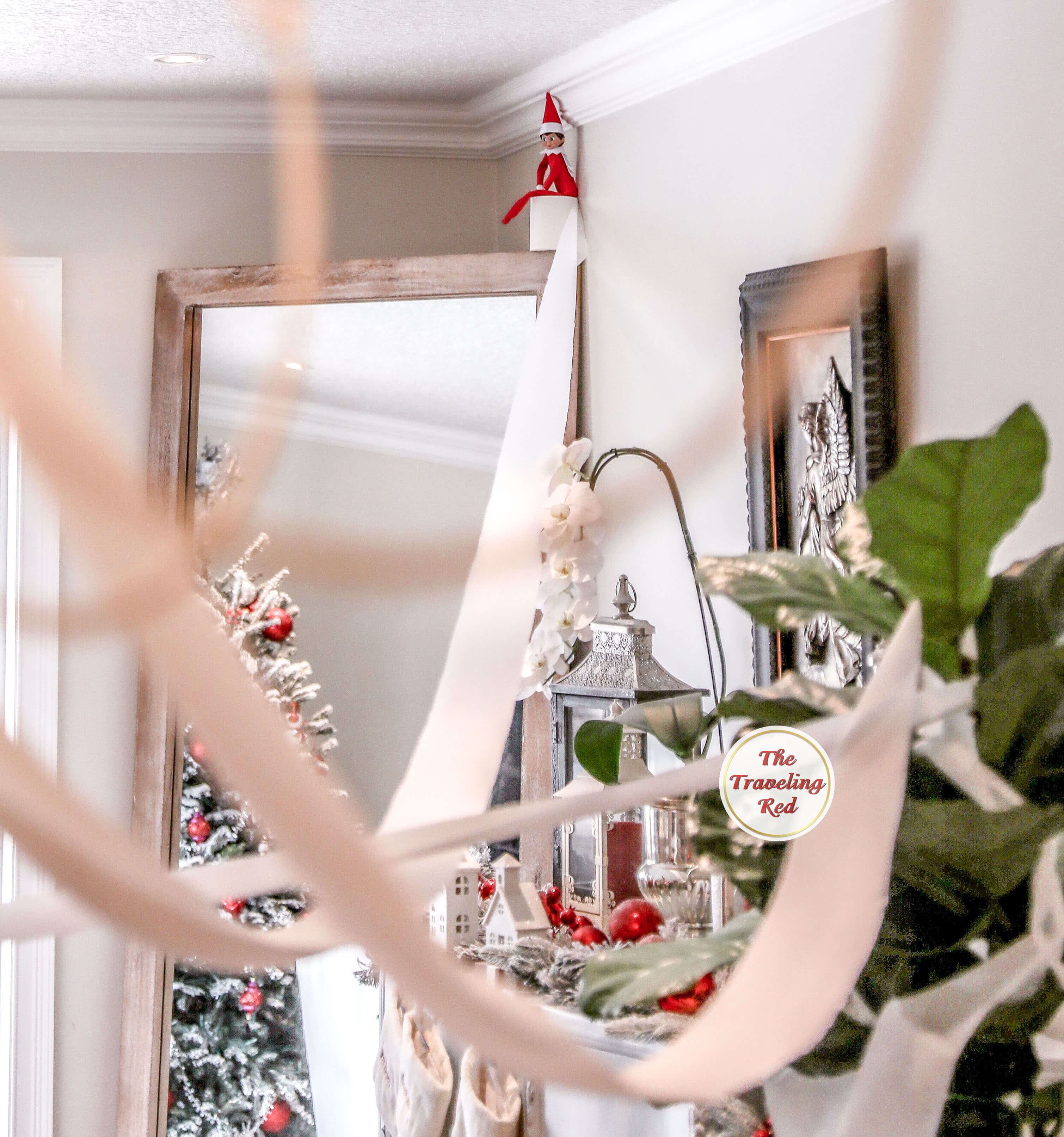 Elf on the Shelf Ideas: Elf TPed our living room- all you need is a roll of toilet paper and be willing to make a big mess. Over 100 easy and quick elf on the shelf ideas that are fun. By The Traveling Red