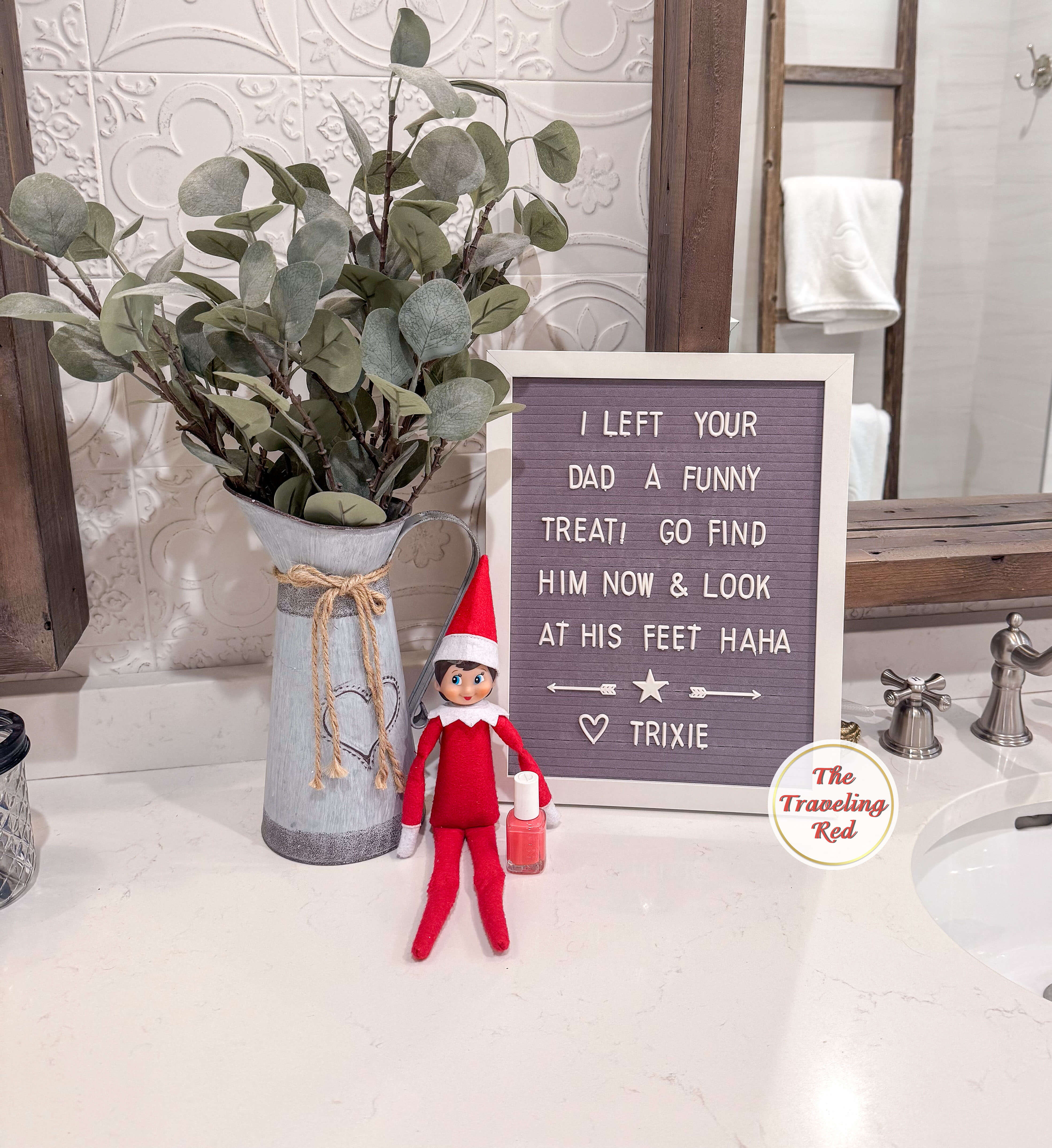 Elf on the Shelf Ideas: Elf is next to a bottle of pink nail polish and the sign says she painted daddy's toenails. The message board reads "I left your dad a funny treat. Go find him now and look at his feet". Over 100 easy and quick elf on the shelf ideas that are fun. By The Traveling Red