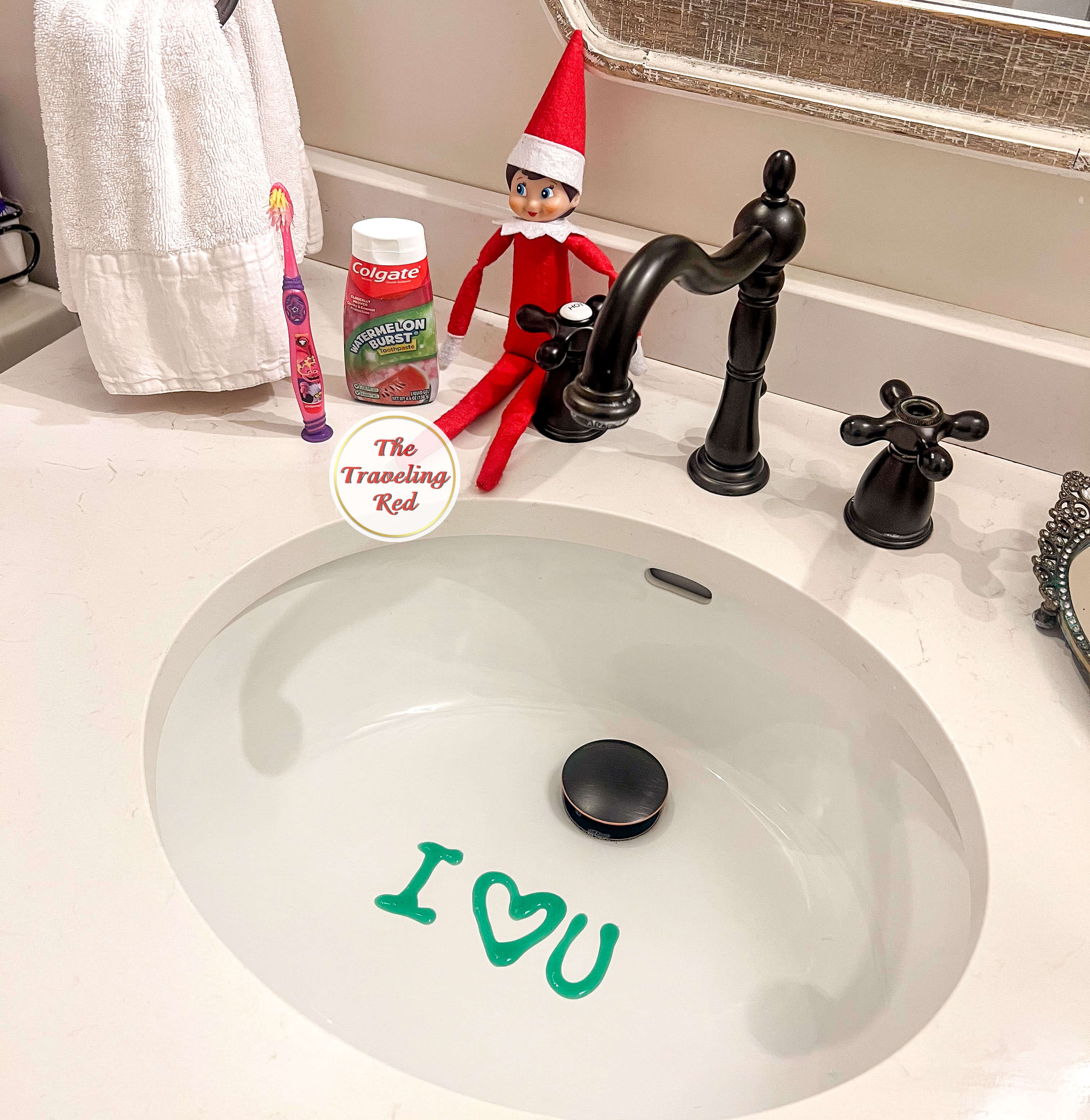 Elf on the Shelf Ideas: Elf wrote I love you in the sink with toothpaste. Over 100 easy and quick elf on the shelf ideas that are fun. By The Traveling Red