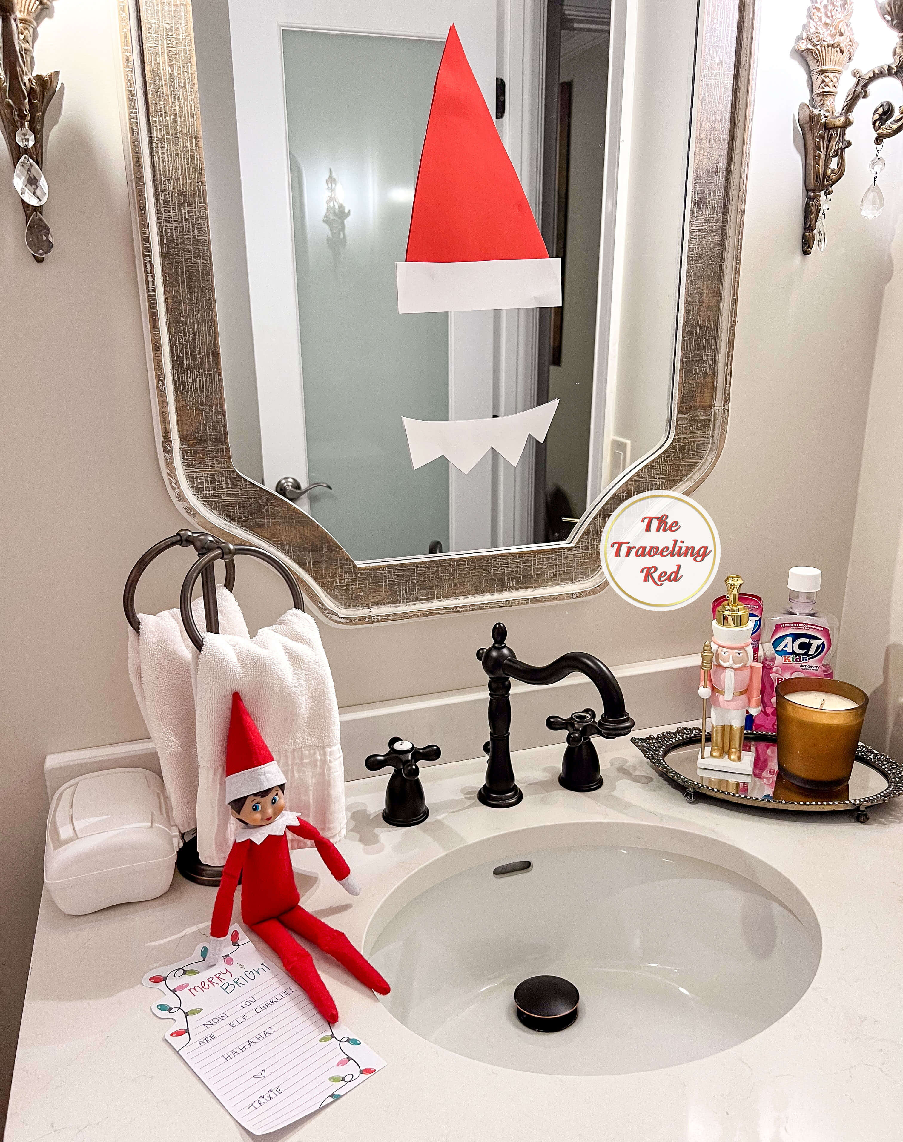 Elf on the Shelf Ideas: Elf made a hat and neck piece then placed them on the bathroom mirror. When the child looks in the mirror they will look like an elf. Over 100 easy and quick elf on the shelf ideas that are fun. By The Traveling Red