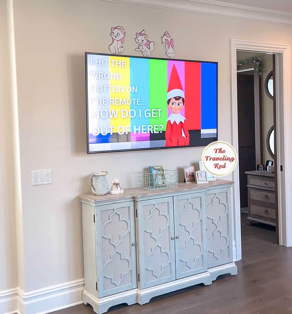 Elf on the Shelf Ideas: Elf is stuck in the TV. There is a long Youtube video playing that appears like the elf is stuck. Over 100 easy and quick elf on the shelf ideas that are fun. By The Traveling Red
