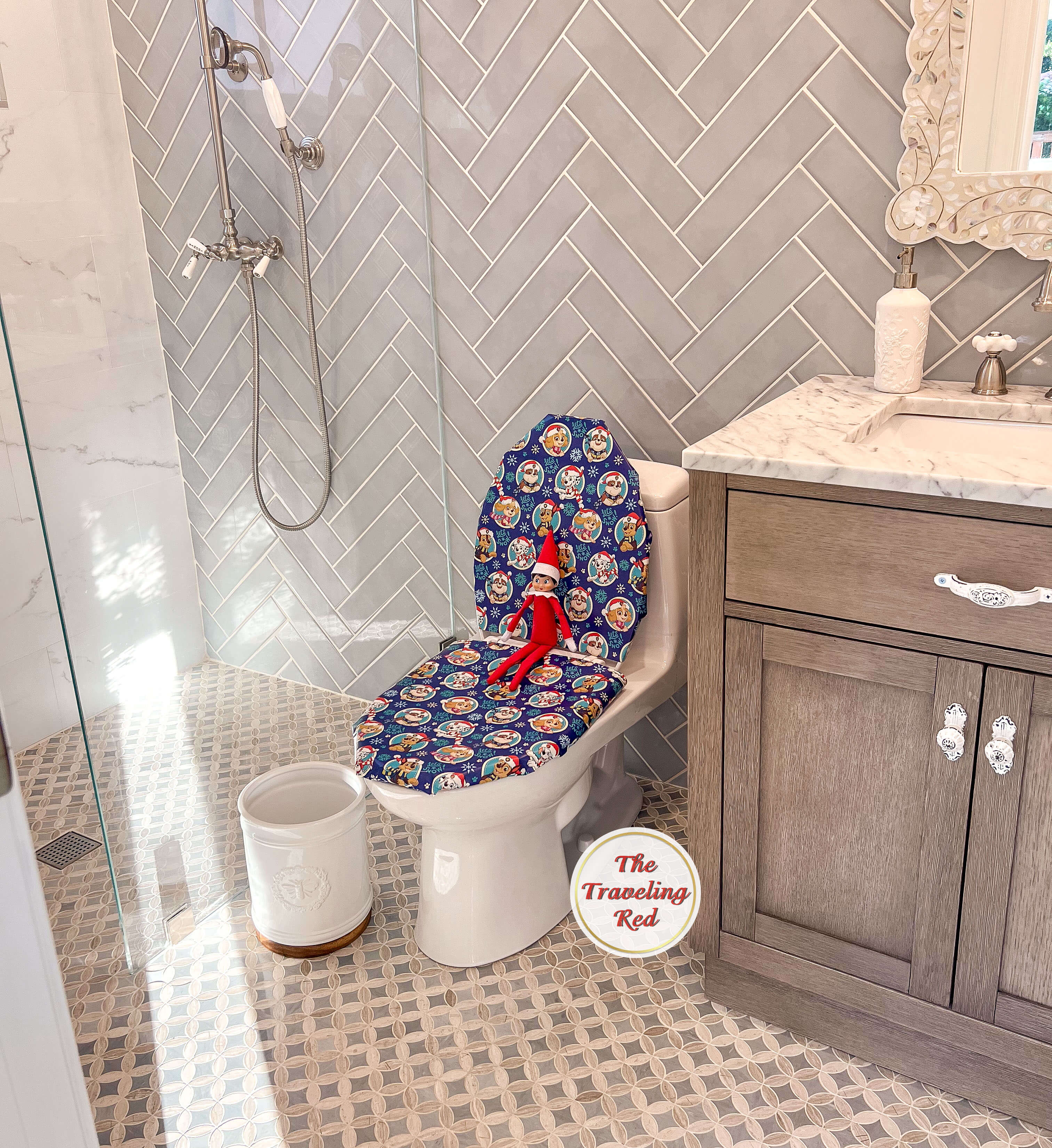 Elf on the Shelf Ideas: Elf wrapped the toilet in wrapping paper. Over 100 easy and quick elf on the shelf ideas that are fun. By The Traveling Red