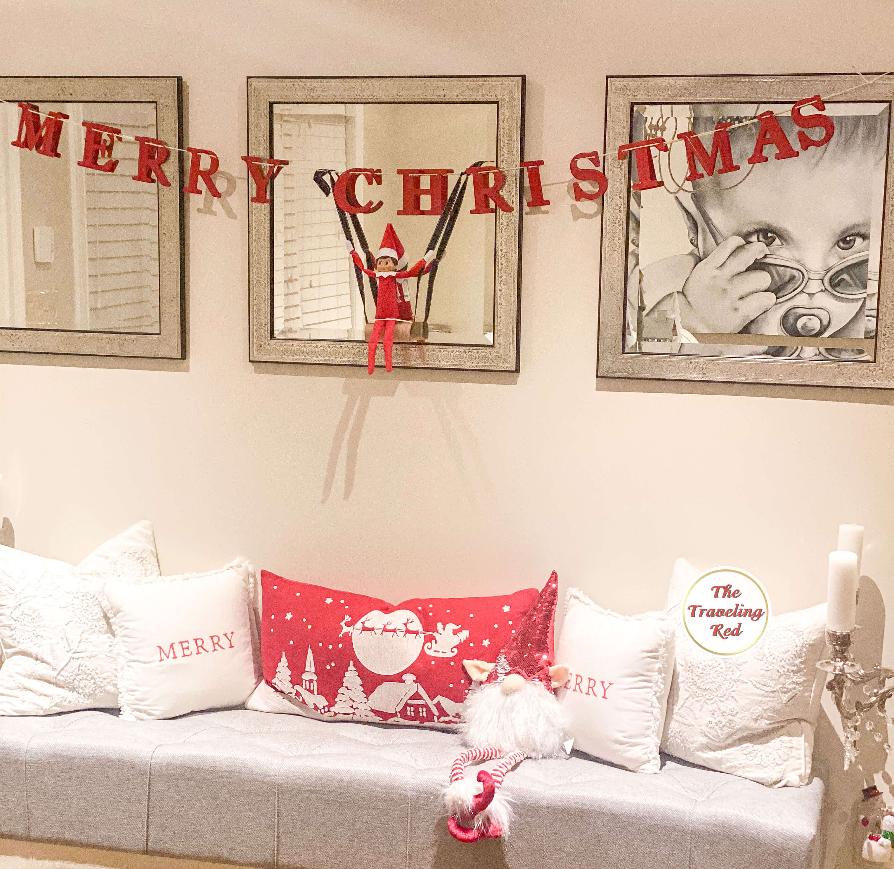 Elf on the Shelf Ideas: Elf is swinging on a toilet paper roll. Over 100 easy and quick elf on the shelf ideas that are fun. By The Traveling Red