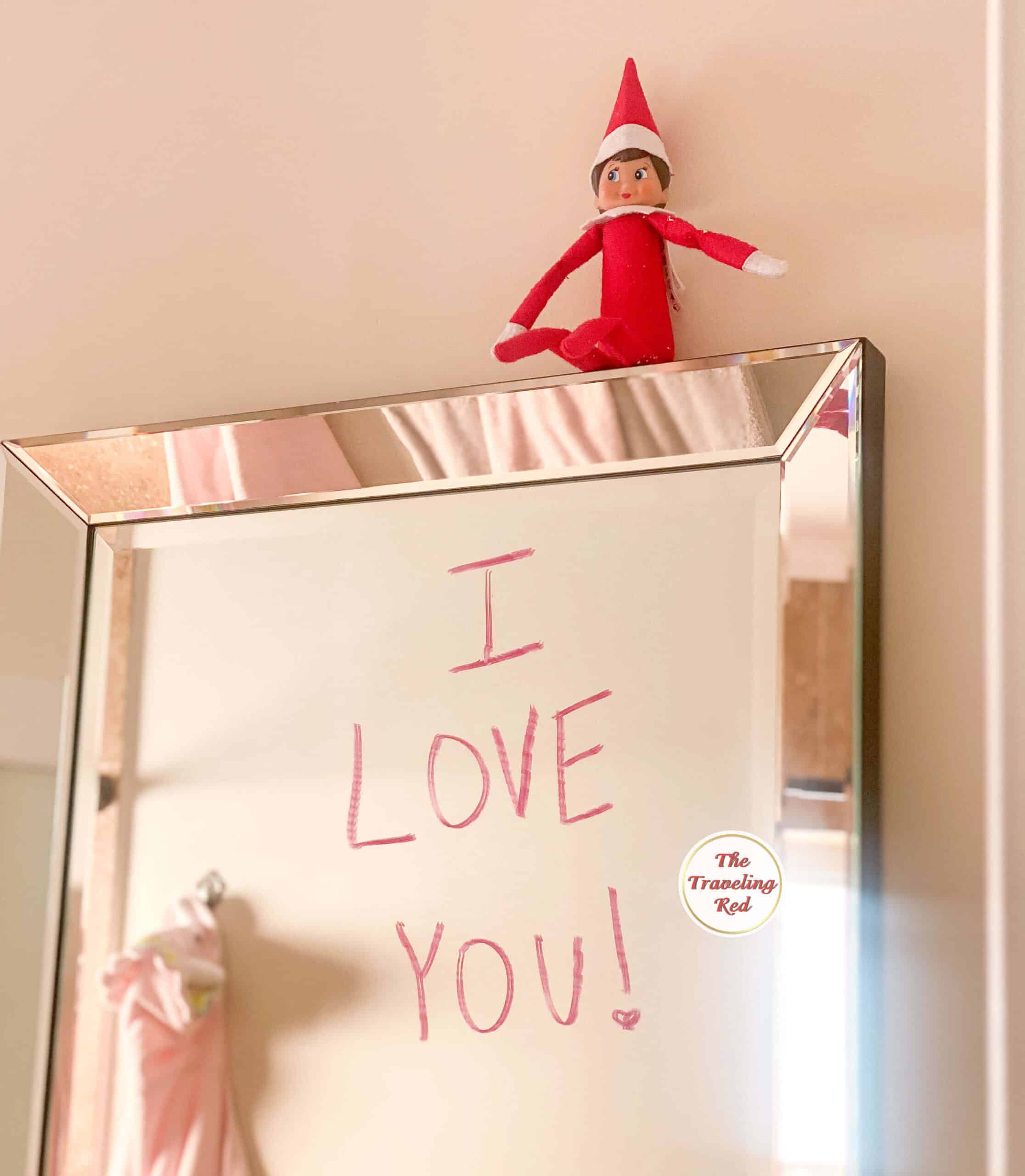 Elf on the Shelf Ideas: Elf wrote a message on the mirror in lipstick. Over 100 easy and quick elf on the shelf ideas that are fun. By The Traveling Red
